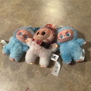 Blue and Red Plush Monster Trio